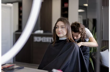 Voděodolná kadeřnická pláštěnka 140 x 100 cm